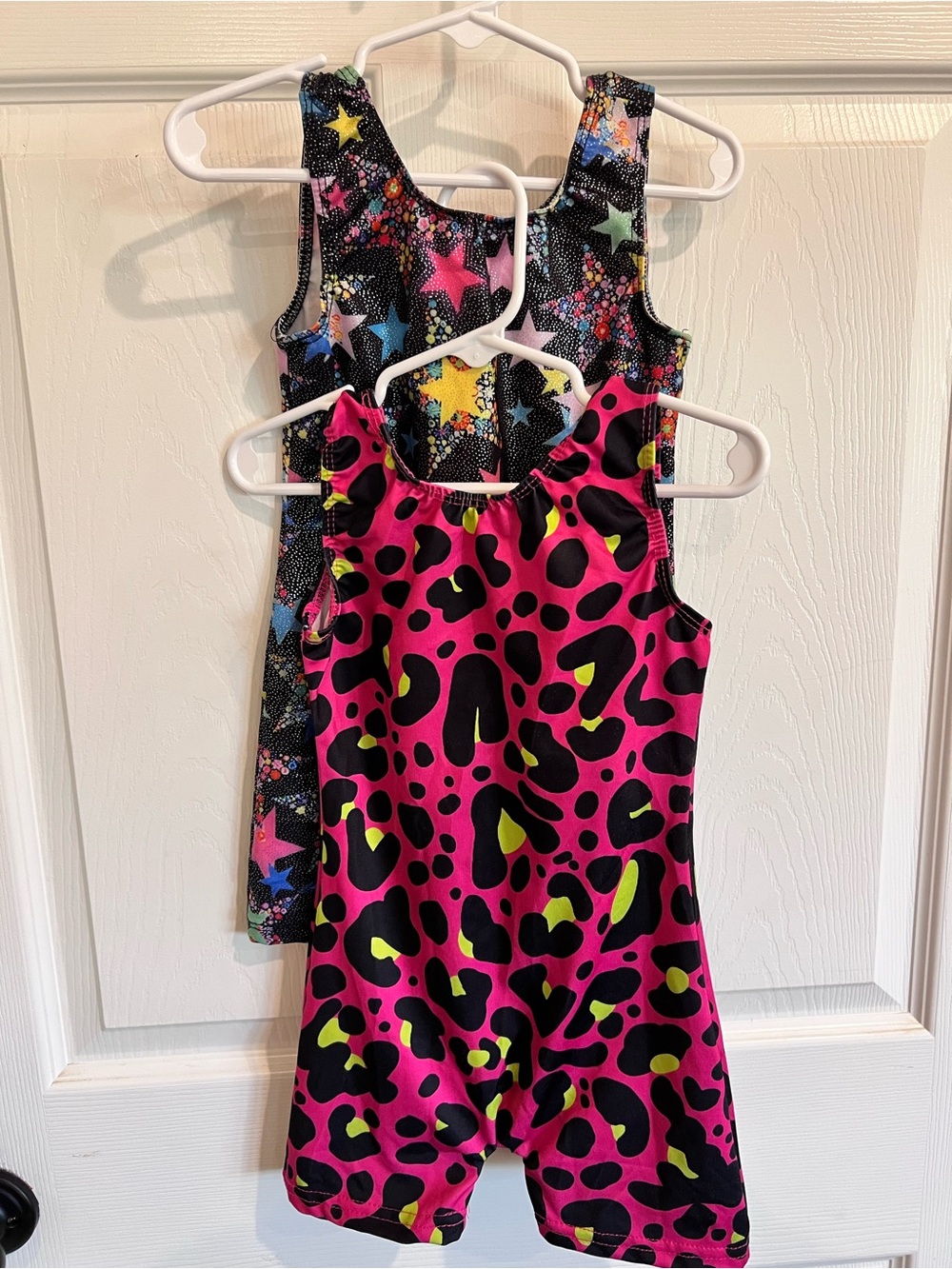 Fun and colorful set of 2 girls’ sleeveless gymnastics/dance biketards!